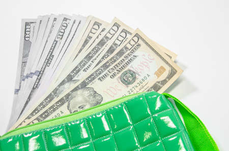 Money in the bag isolated on a white backgroundの写真素材