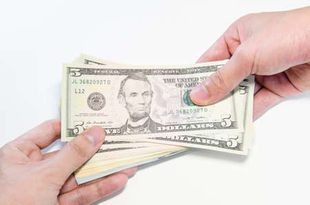 hands giving moneyの写真素材