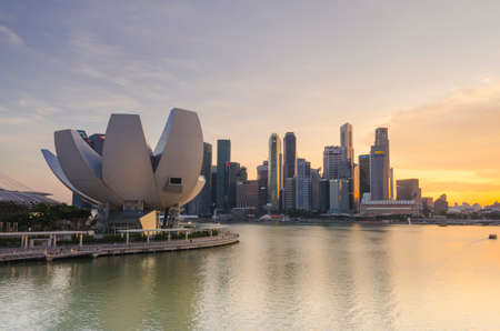 SINGAPORE, SINGAPORE - MAY 13: The skyline of Singapore lit up at night with the ArtScience Museum in the foreground. Photo taken May 13, 2014 in Singapore, Singapore.のeditorial素材