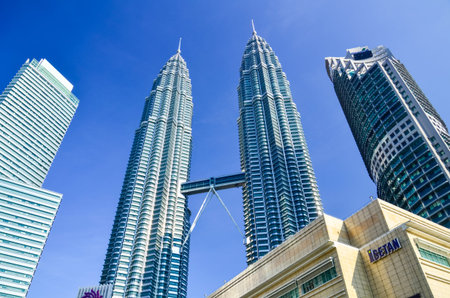 KUALA LUMPUR, MALAYSIA -MAY 11: Petronas Twin Towers at day on May 11, 2014 in Kuala Lumpur. Petronas Twin Towers were the tallest buildings (452 m) in the world from 1998 to 2004のeditorial素材