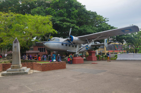 MALACCA, MALAYSIA - MAY 11 : Visitors view historic aircraft on MAY 11, 2014 at Melaka, Malaysia. Airplane used by first Prime Minister of Malaysia in 1954 to seek independence for Malaysia.のeditorial素材
