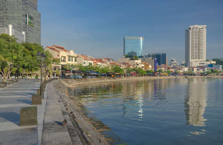 SINGAPORE-May 13: Business district and Boat Quay on May 13, 2014 in Singapore. Central Business District (CBD), located at south of Singapore River.のeditorial素材