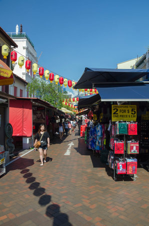 SINGAPORE - MAY 13: Bustling street of Chinatown district on May 13, 2014 in Singapore. Singapore's...