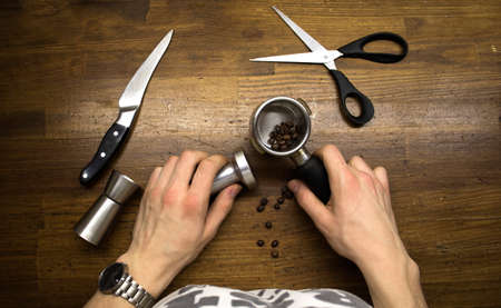 Barista equipment on a wooden tableの写真素材