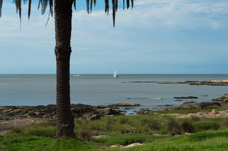boat sailing towards the coast, uruguayan coast