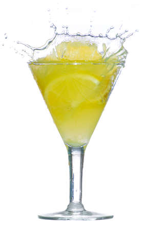 Splashes of lemon juice on white backgroundの写真素材