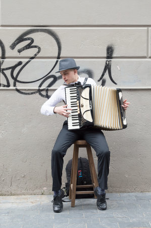 MONTEVIDEO, URUGUAY - OCTOBER 8, 2017: Street musician with accordion.