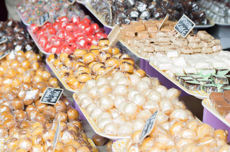 candy stand and chocolates in the marketの写真素材