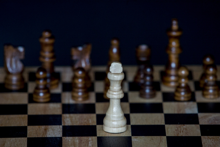 chess pieces with the king in the centerの写真素材