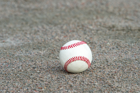 one baseball on infield of sport fieldの写真素材