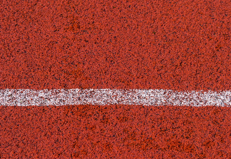 running track rubber standard red color and white lineの写真素材