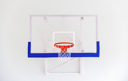 Basketball hoop cage, isolated large backboard closeup, new outdoor court set, blue, red, orange, white back board blank copy space backgroundの写真素材