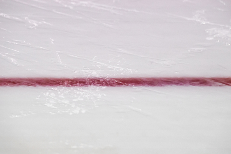 Ice hockey rink red markings closeup, winter sport backgroundの写真素材