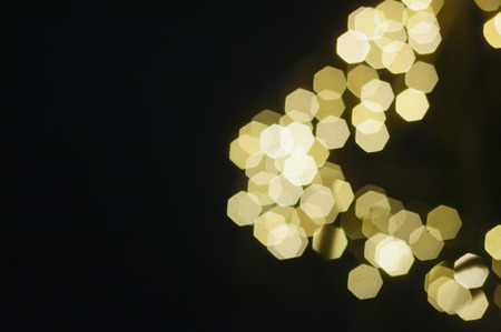 Beautiful Christmas gold bokeh background with blank copy spaceの写真素材