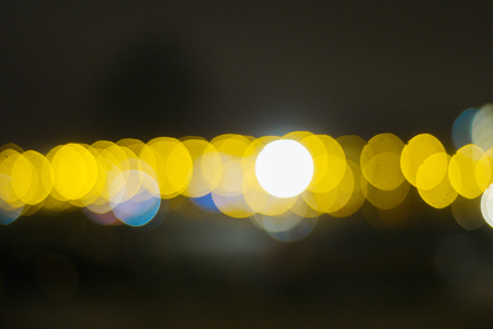 Beautiful Christmas gold bokeh background with blank copy spaceの写真素材