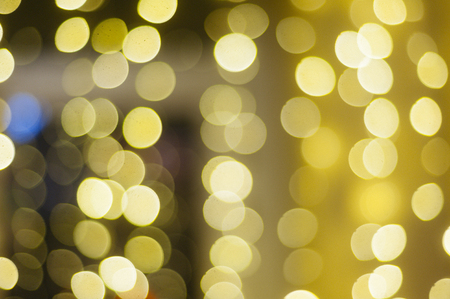 Beautiful Christmas gold bokeh background with blank copy spaceの写真素材