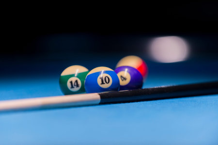 Billiard balls on pool blue table - sport background
