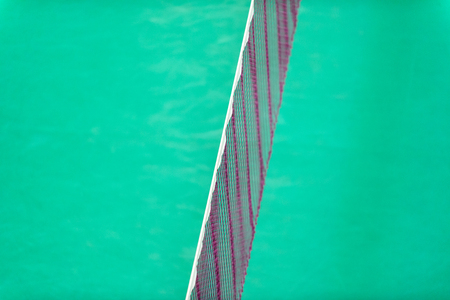 Badminton net indoor on badminton court, closeup view of badminton net with blurry backgroundの写真素材