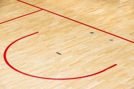 wooden floor volleyball, futsal, basketball, badminton court with light effect Wooden floor of sports hall with marking lines line on wooden floor indoor, gym courtの写真素材