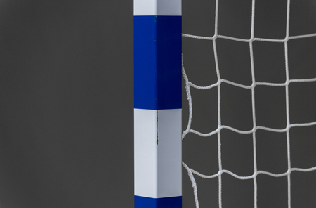 Gate for futsal or handball in gym. Detail of gate frame and net. Outdoor football or handball playgroundの写真素材
