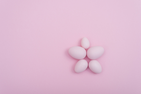 Spreaded Easter eggs on pink backgroundの写真素材
