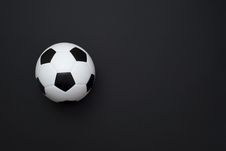 soccer ball or football on black backgroundの写真素材