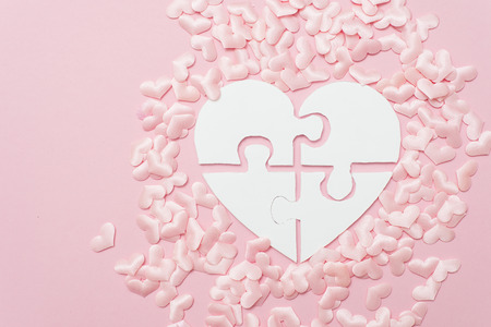 Pink heart puzzle shape decoration background. Autism conceptの写真素材