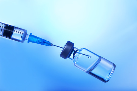 Medical concept Vaccination vaccine vial dose flu shot drug needle syringeの写真素材