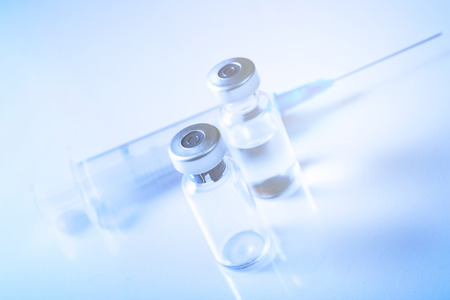 Medical concept Vaccination vaccine vial dose flu shot drug needle syringeの写真素材