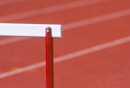 hurdle on the red running track prepared for competitionの写真素材