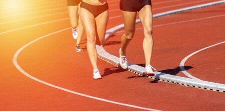 Close up of runners feet  on the track fieldの写真素材