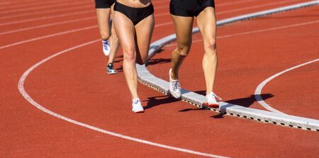 Close up of runners feet on the track fieldの写真素材