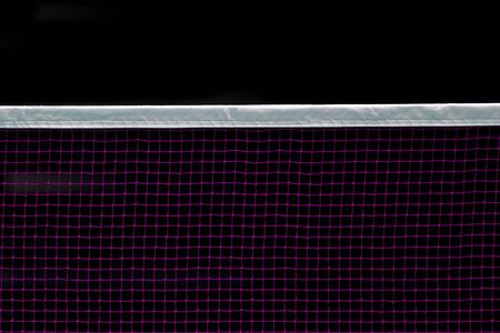 Badminton net indoor on badminton court, closeup view of badminton net with black backgroundの写真素材