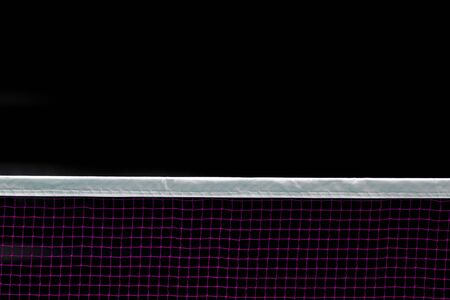 Badminton net indoor on badminton court, closeup view of badminton net with black backgroundの写真素材