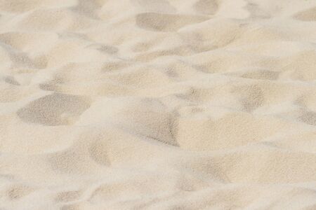 closeup of sand pattern of a beach in the summerの写真素材