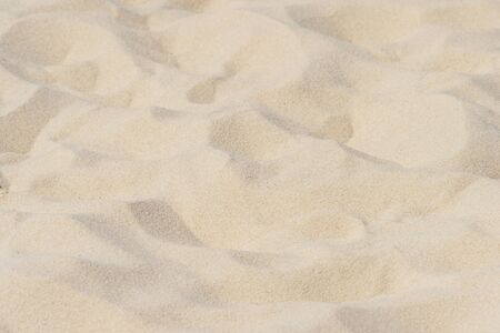 closeup of sand pattern of a beach in the summerの写真素材