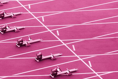 Starting blocks in track and field. Pink color filterの写真素材