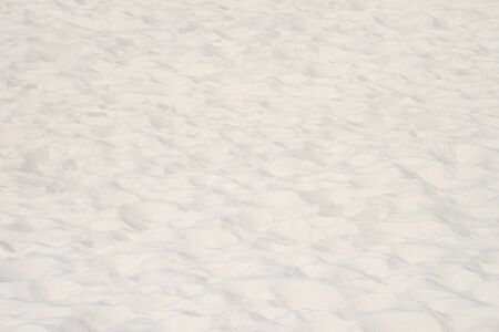 closeup of sand pattern of a beach in the summerの写真素材