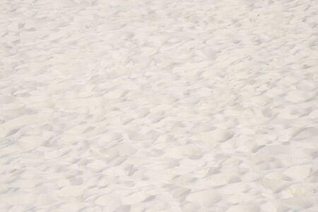 closeup of sand pattern of a beach in the summerの写真素材