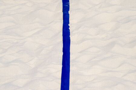 beach volleyball, soccer, handball court up close and in detail with blue plastic line markerの写真素材