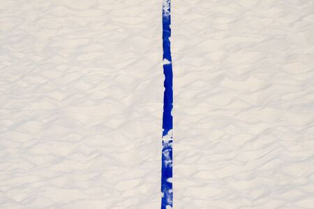 beach volleyball, soccer, handball court up close and in detail with blue plastic line markerの写真素材