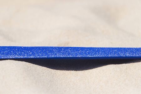 beach volleyball, soccer, handball court up close and in detail with blue plastic line markerの写真素材