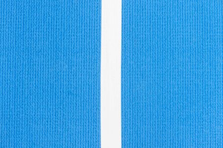 Blue running track synthetic rubber on the athletic stadium.の写真素材