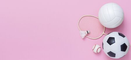 Photo of various sport equipments on pink backgroundの写真素材
