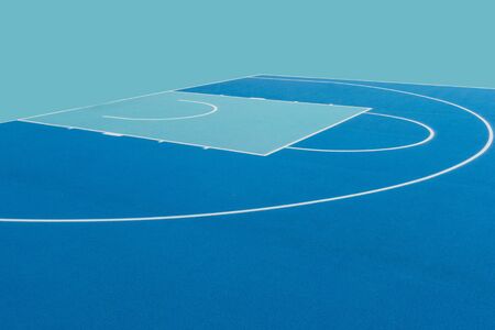 Abstract, blue background of newly made outdoor basketball court. Visible asphalt texture, freshly painted linesの写真素材