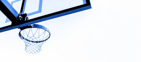 Basketball hoop isolated on white background. Blue filter.の写真素材