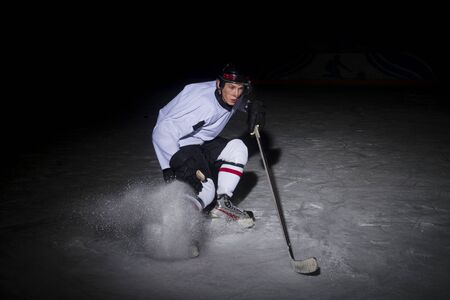 ice hockey Players in dynamic action in a professional sport game play in hockeyの写真素材