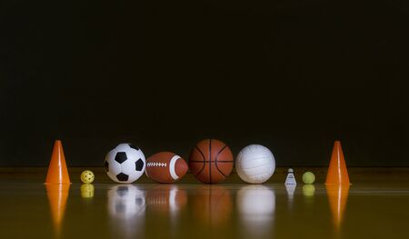 Close-up Of Various Sport Equipments Isolated On Black Backgroundの写真素材