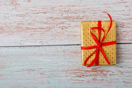 Christmas Gift Box Placed On Wooden Planks
