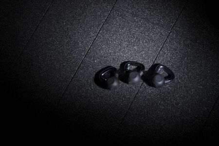 Close-up kettlebell sports equipment weight on the floorの写真素材